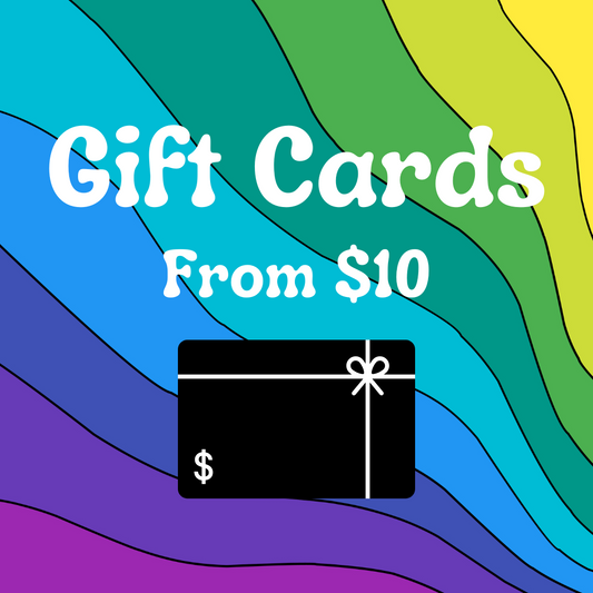 A multicolored gift card from Fat Lady Crochet, featuring a black card with a dollar sign and the text 'Gift Cards from $10' set against a colorful, patterned background.