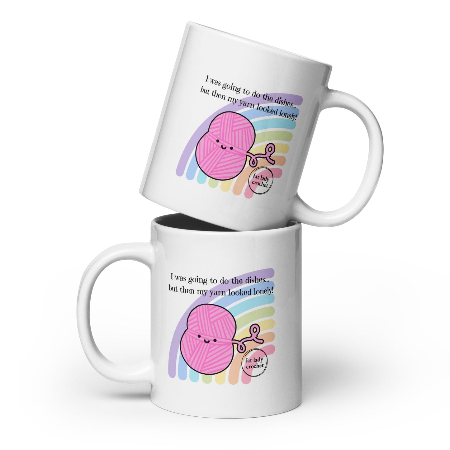 Two white mugs with a pink yarn ball and rainbow design, featuring text about yarn and dishes on a white background.