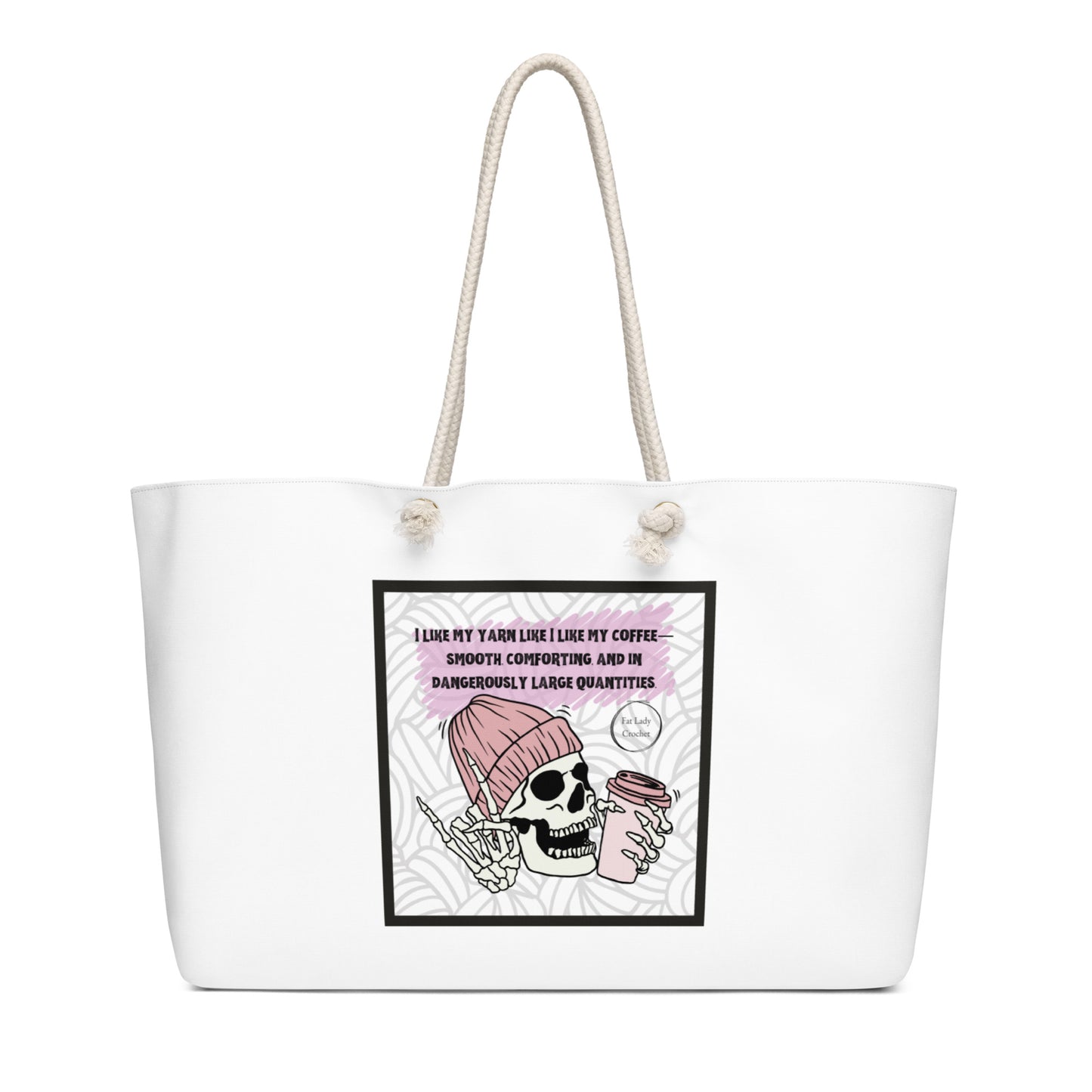 White tote with skull wearing a beanie and holding a cup of coffee and making the rock-on hand sign, underneath the quote "I like my yarn like I like my coffee. Smooth, comforting, and in dangerously large quantities"
