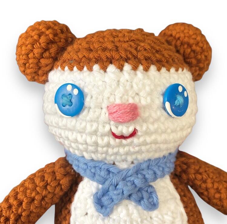 A close-up of Jeremy bears face set against a white background