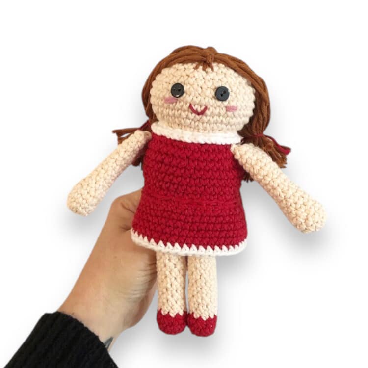 A toy from Misfit Island in Rudolph the Red-Nosed Reindeer. A crochet version of the doll with red dress and shoes and pigtails.