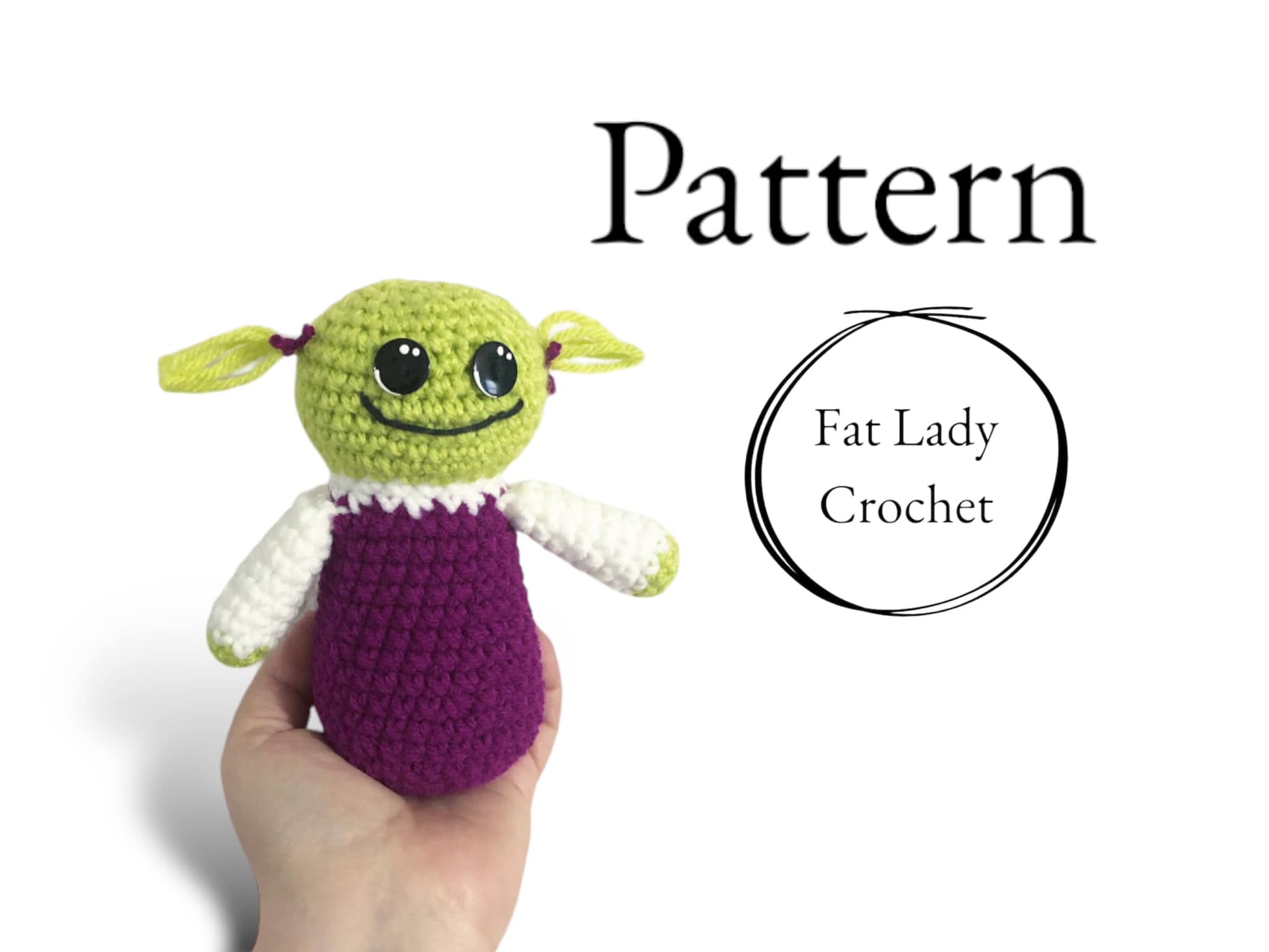 A crocheted doll resembling Mona from Nanalan being held up against a white background with text that reads "Pattern," and "Fat Lady Crochet."