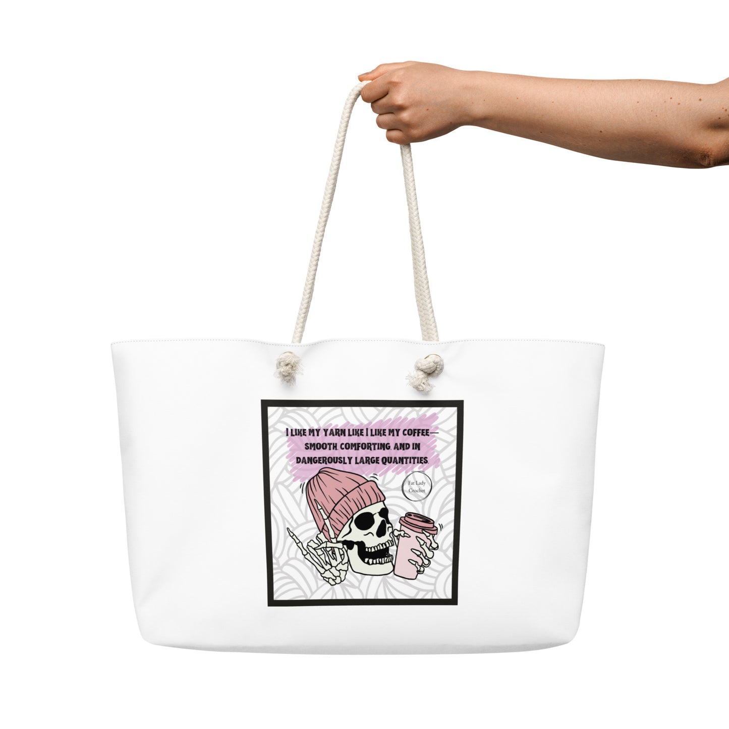 White totebag being held with graphic design of a skeleton holding a coffee cup and making the rock on hand sign.