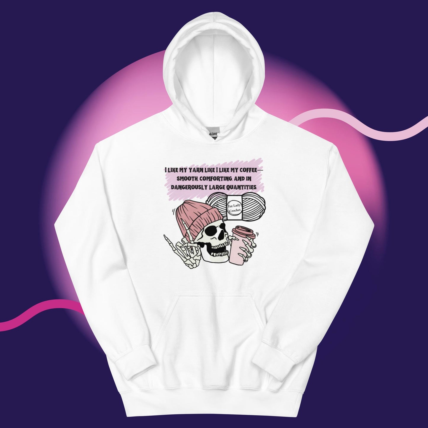 A white hoodie with a skeleton wearing a dark pink beanie and holding a cup of coffee.