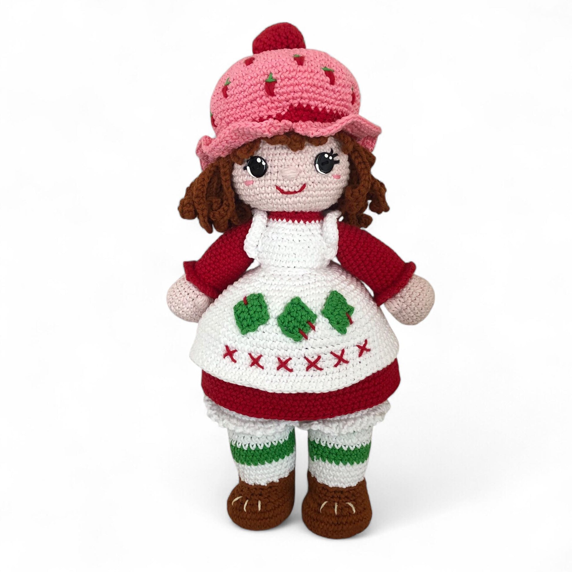 crochet strawberry shortcake doll set against a white background.