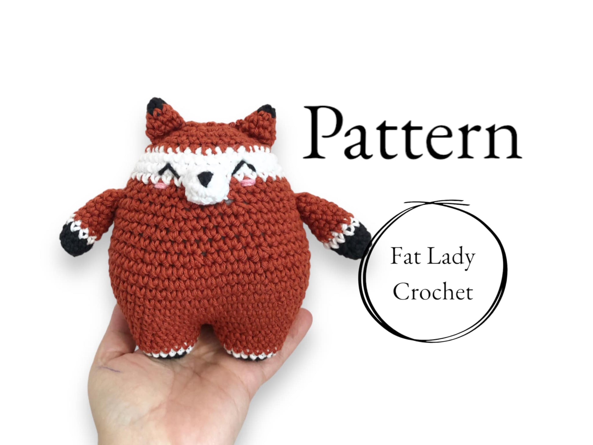 A crochet doll resembling a chubby fox being held up against a white background with text that states "Pattern" and "Fat Lady Crochet."
