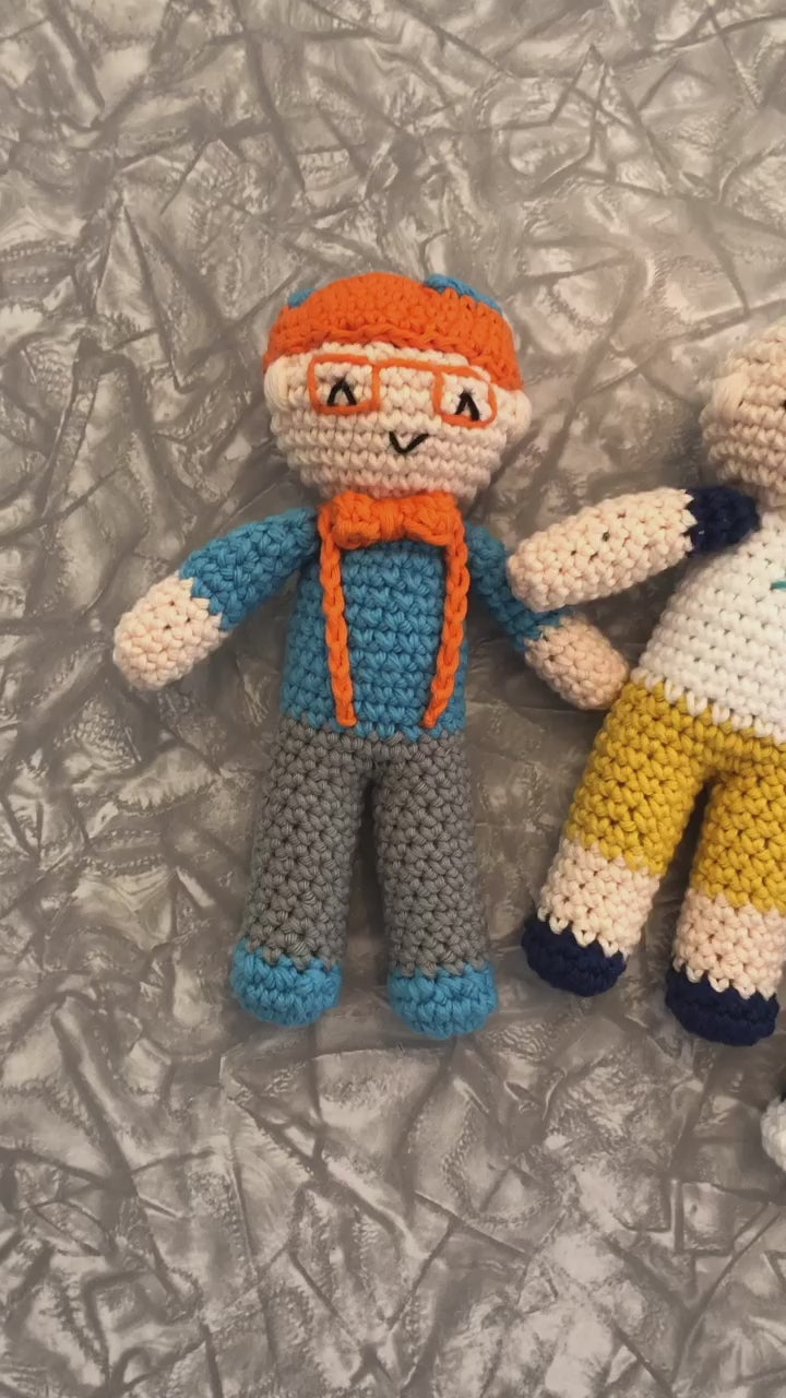 A 13 second video advertising the crocheted dolls against a mottled grey background.