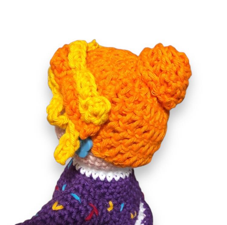 Crocheted Mrs. Frizzle close-up of the hair and side of the head. 