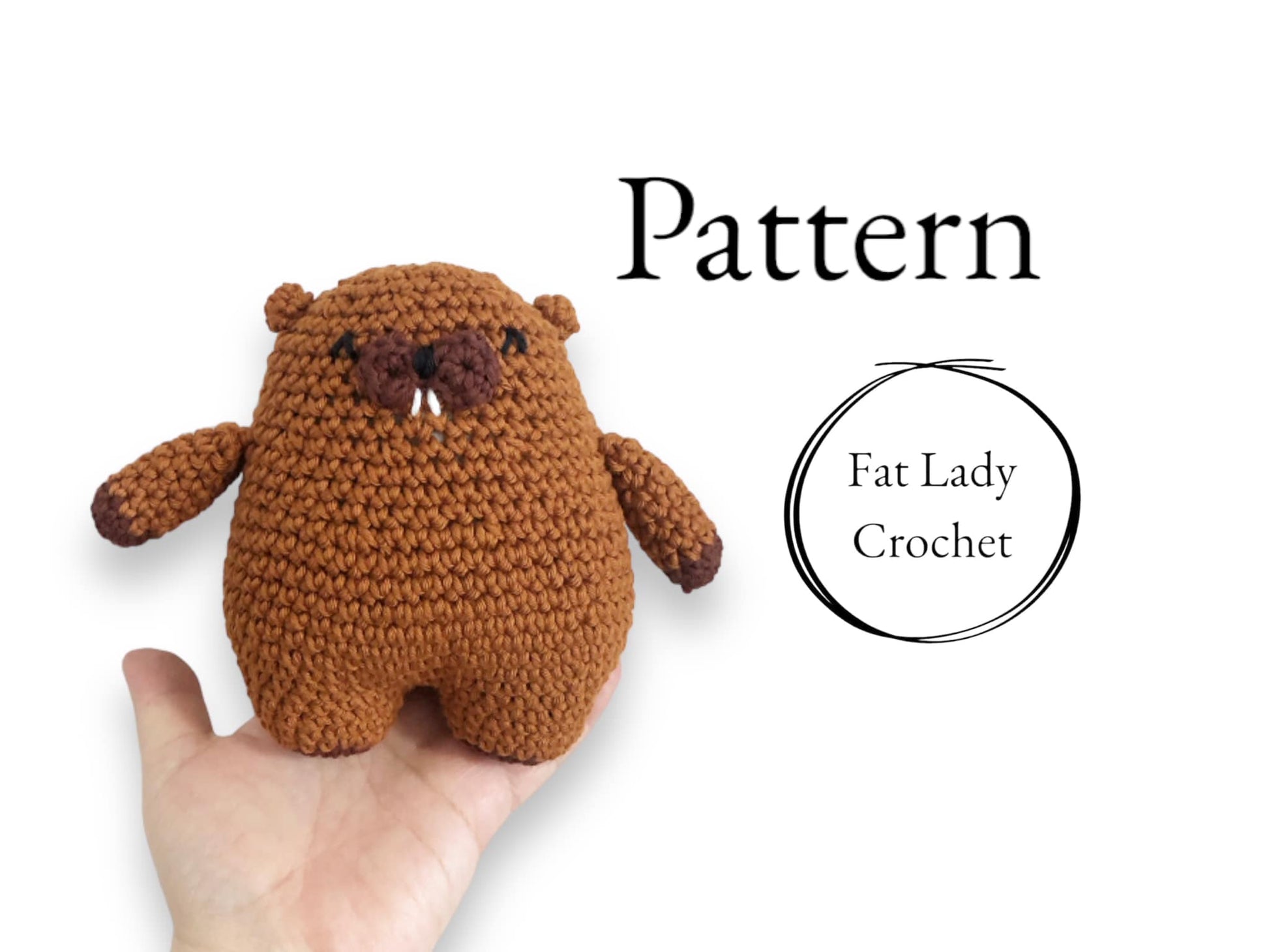 A crocheted plushie resembling a beaver being held up against a white background with text that reads "Pattern," and "Fat Lady Crochet." 