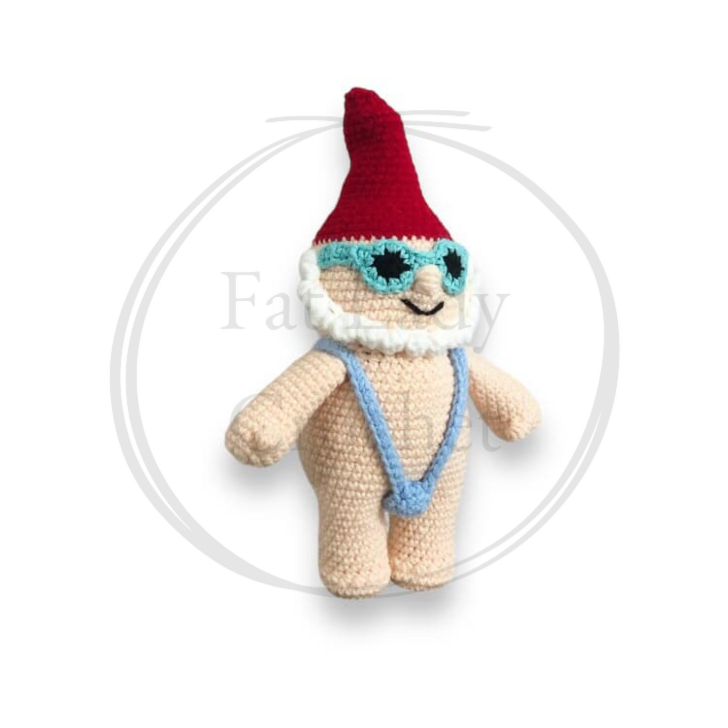 a crochet doll of a gnome in a mankini standing against a white background. 