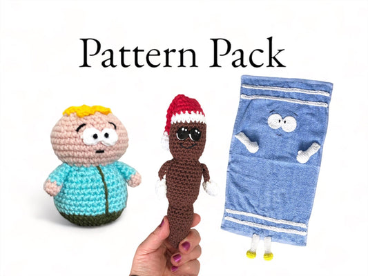 The image shows a hand holding a crocheted Towelie, a crocheted Butters, and a crocheted Mister Hankey, all from the South Park series. The background is white with the text 'PATTERN PACK' written on it.