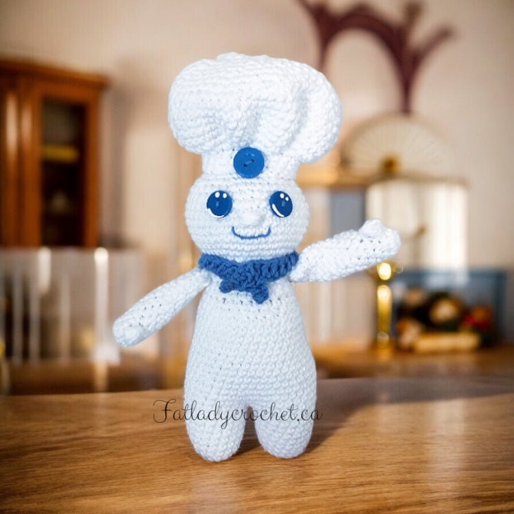Pillsbury Doughboy set against a kitchen backdrop.  