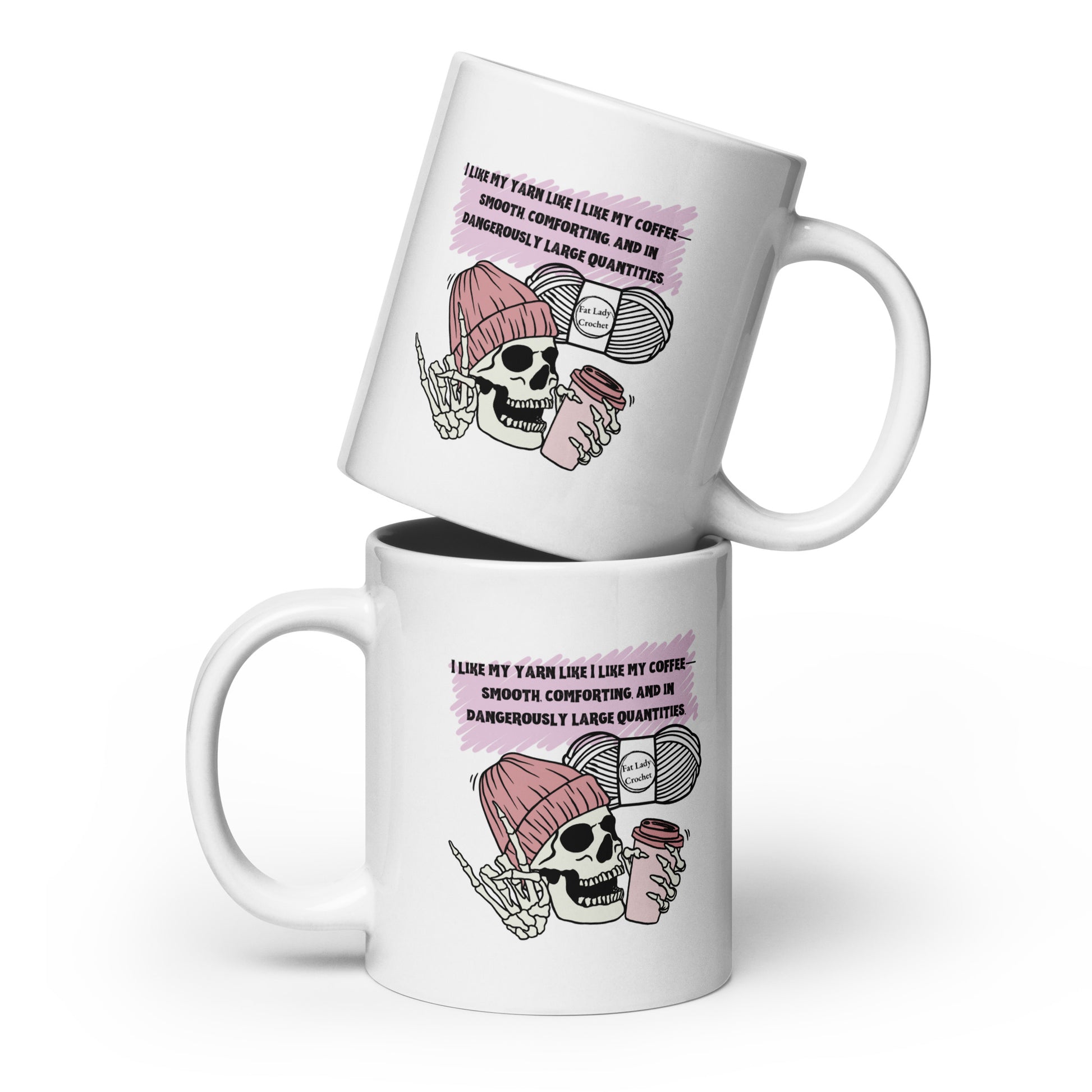 Two white mugs with skull and knitted hat designs and text on a white background